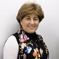 Woman smiling for camera.